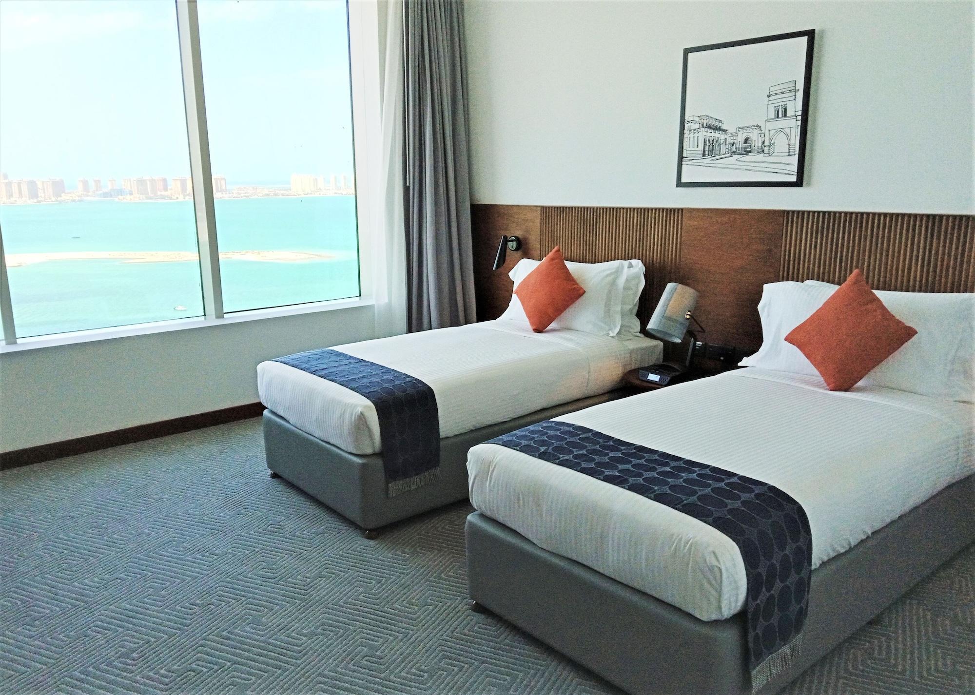 Somerset West Bay Doha Exteriör bild Deluxe Room