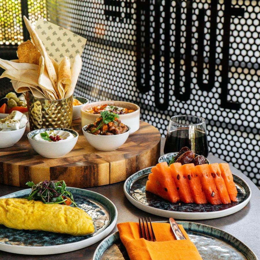 Somerset West Bay Doha Exteriör bild A selection of dishes at the restaurant