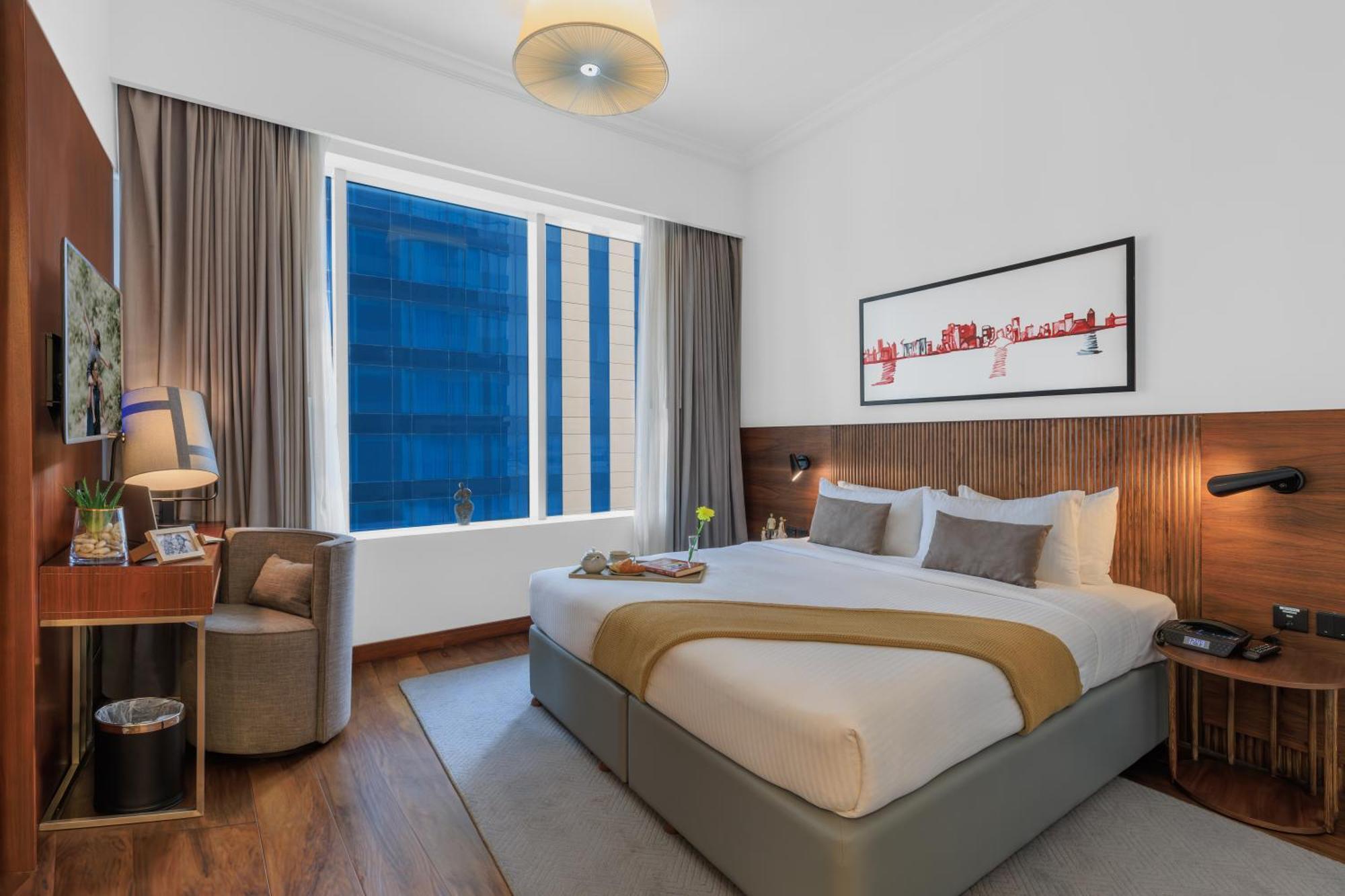 Somerset West Bay Doha Exteriör bild A bedroom at the hotel